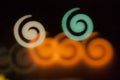 Blurred photo of defocused bokeh colorful lights in the shape of spiral Royalty Free Stock Photo