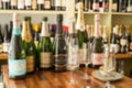 Blurred Photo of Empty and Unopened Wine Bottles