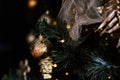 Blurred picture of christmas tree with lights and spruce branch. Defocused new year background with space for text Royalty Free Stock Photo