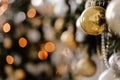 Blurred picture of christmas tree with lights and spruce branch. Defocused new year background with space for text Royalty Free Stock Photo