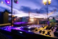 Blurred picture of Dj professional equipment for party outdoor at sunset - Defocused image - Concept of nightlife with music and Royalty Free Stock Photo