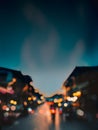 Blurred image of people walking at night market in Thailand