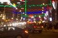 Blurred picture of urban illumination in honor of the winter holidays