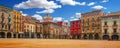 blurred Plaza Mayor in Vic on a sunny day filled with tourists, Catalonia, Spain. Selective focus Royalty Free Stock Photo