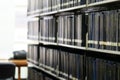 Blurred public library bookshelf in library room Royalty Free Stock Photo