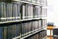 Blurred public library bookshelf in library room Royalty Free Stock Photo