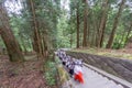 Blurred pupil climbing stairs for visiting temple