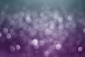 Blurred purple glitter bokeh abstract light background