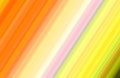 Blurred purple yellow orange light diagonal stripes computer generated picture background.