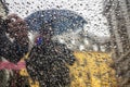 Blurred raindrops in a glass window during the rain