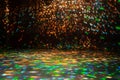 blurred rays of light on disco floor. orange green blue neon searchlight lights. laser lines and lighting effect Royalty Free Stock Photo