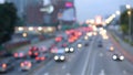 blurred realtime footage of traffic on the highway in the evening. full hd 1080p h264 codec