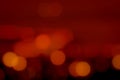 Blurred red and orange bokeh background. Blur abstract background of urban light. Warm light with beautiful pattern of round Royalty Free Stock Photo