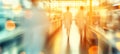 Blurred Researchers Walking in a Modern Laboratory, Abstract Science and Technology Background Royalty Free Stock Photo