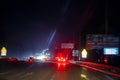 blurred road on a highway in the rain at night. Poor visibility on the road. Royalty Free Stock Photo