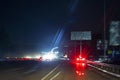 blurred road on a highway in the rain at night. Poor visibility Royalty Free Stock Photo