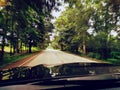 Blurred of road landscape look through windshield