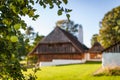 Blurred romantic chalet with in-focus appletree