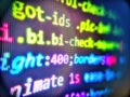 Blurred screen with selective focus. Abstract computer script code. Software development. Computing, cyberspace , future and