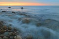 Blurred sea wave at dawn