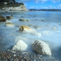 Blurred sea waves on the shingle beach