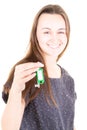 Blurred selective focus beautiful business young real estate woman handing apartment house key