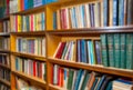 Blurred shelf with books