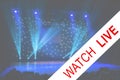 Blurred show backdrop. Sparkling stage lights. Several projectors in the dark. Blue light beams spotlights on stage at time of