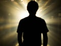 Blurred Silhouette of a man standing on lighting flare Royalty Free Stock Photo