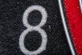 Abstraction background with part of an old darts board with the number 8 Royalty Free Stock Photo