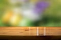 blurred springbackground with wooden desk