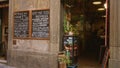 Blurred street cafe storefront with shallow bokeh on a rome street; background backplate copyspace calm Royalty Free Stock Photo