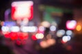 Blurred street lights, urban abstract background. defocused image of night city. Vehicles on the road. Royalty Free Stock Photo