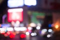 Blurred street lights, urban abstract background. defocused image of night city. Vehicles on the road. Royalty Free Stock Photo