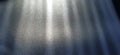 Blurred striped dark black and blue background. Play of light and shadow. Light rays. Divine or heavenly radiance from above. Royalty Free Stock Photo