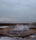 Blurred. The eruption of the Strokkur geyser in the southwestern part of Iceland in a geothermal area near the river Hvitau