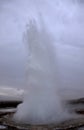 Blurred. The eruption of the Strokkur geyser in the southwestern part of Iceland in a geothermal area near the river Hvitau