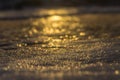 Blurred sunlight on the sea foam macro