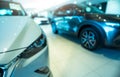 Blurred SUV car parked in modern showroom. Car dealership and auto leasing concept. Automotive industry. Modern luxury showroom. Royalty Free Stock Photo