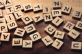Blurred Text dice cube background. abstract blur. Text dice cube concept / Letter dices alphabet on wooden background. Block of