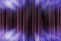 Blurred theater stage with purple curtains, abstract image of concert lighting