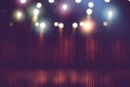 Blurred theater stage with red curtains and spotlights, Royalty Free Stock Photo