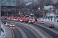 Blurred traffic on asphalt road in city with white and read bokeh lights on cars Royalty Free Stock Photo