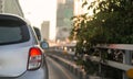 Blurred traffic jam and car brake light in bangkok, thailand on evening with sunlight and copy space Royalty Free Stock Photo