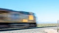 Blurred train engine passes quickly Royalty Free Stock Photo