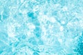 Blurred transparent blue colored clear calm water surface texture with splashes and bubbles. Trendy abstract nature background. Royalty Free Stock Photo