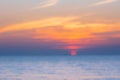 blurred of Tropical Colorful sunset over ocean on the beach. at Thailand Tourism background with sea beach Royalty Free Stock Photo