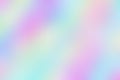 Blurred unclear iridescent background of smooth holographic paper.