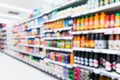 Blurred variety of fruit juice concentrate and Mixed fruit juice on shelves at grocery store supermarket Royalty Free Stock Photo