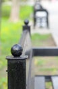 Blurred view of the alley in the park with benches